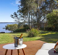 Braeside - waterfront fireplace - Holiday Byron Bay