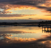 Reflections on Merimbula Lake - Holiday Byron Bay
