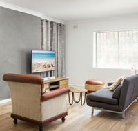 Suburban Two-bed Apartment with Parking and Patio